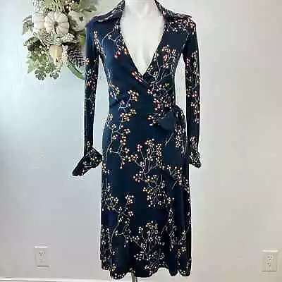  First Bloom  Diane Von Furstenberg Iconic Vintage Wrap Dress.  • $179