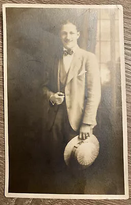 Vintage RPPC Photo Postcard Man Gentleman In Suit Bowtie Holding Hat AZO C1910 • $5.84