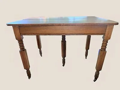 Early 20th Century Pine Wood 5th Leg Dining Table On Casters (36L X 42W X 30H) • $683.99