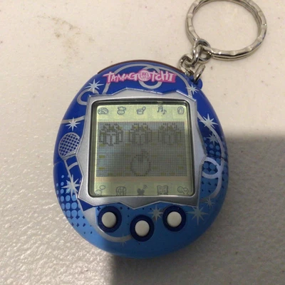 $130 • Buy 2004 Bandai Wiz Blue Microphone Tamagotchi On Key Chain (105) #632