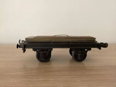 BING O GAUGE FLAT TRUCK WITH SHEET METAL LOAD. Black. • $60