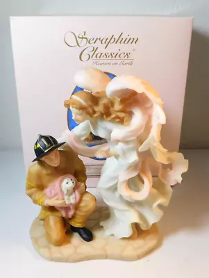 SERAPHIM CLASSICS ANGEL WITH FIREMAN  CARING TOUCH  FIGURINE W/ BOX #81775 • $24.99