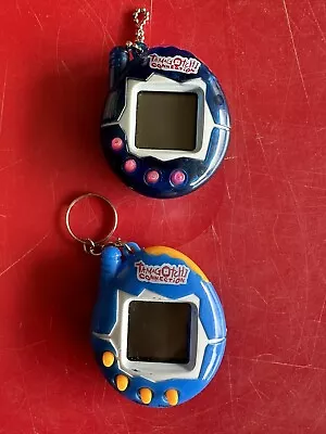 Tamagotchi Connection 4 Button Virtual Pet Lot OF 2 TESTED WORKING  Toy • $48