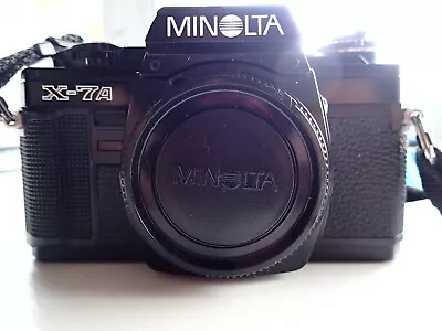 Minolta X-7A SLR Film Camera W/two Lenses Strap Manual And Flash Unit • $150