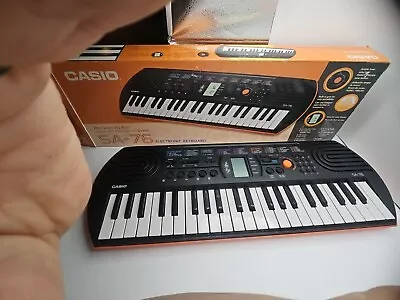 N.O.S. Casio Mini Keyboard SA-76 44 Key Black & Orange Electronic Keyboard • $89.95