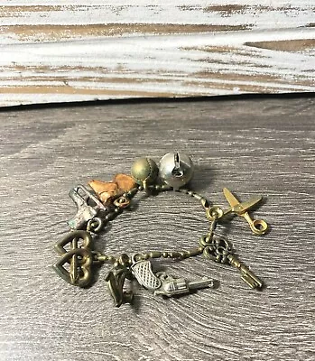 Vintage Child’s Charm Bracelet With 9 Charms- 6  Long- Metal And Plastic  • $9.99