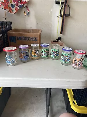 Set 7 Lot Lids Welch's Mickey Comic Lion King Glass Jelly Jars Tom & Jerry • $19.99