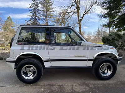 For:1989-1998 Geo Tracker 2Dr/Suzuki Sidekick Fender Trim Stainless 4Pc 2 1/2  • $159.99