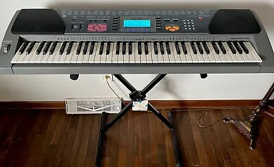 Casio WK 1200 Keyboard. 76 Keys With Stand.  Missing Cord Runs On Batteries. • $110