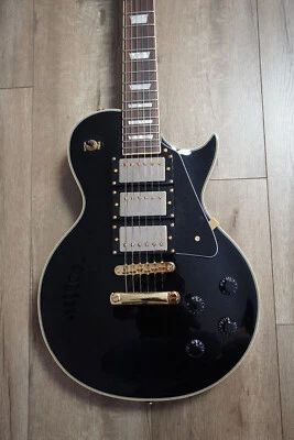 $410 • Buy Vintage V1003 ReIssued, Triple Humbucker, Black And Gold Electric Guitar