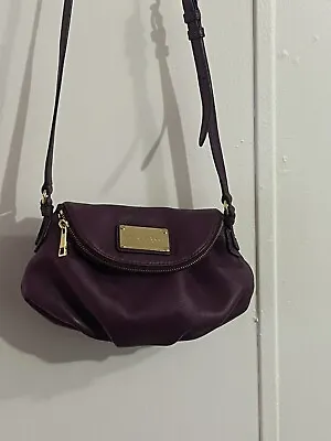 Marc Jacob’s Small Purple Crossbody Bag. • $91