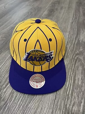 Los Angeles Lakers Mitchell & Ness  SnapBack Adjustable Hat Yellow/Purple Strips • $25