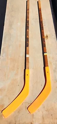 TWO 1970s BOBBY CLARKE Flyers Official STREET HOCKEY Stick Orange Wood Vintage  • $49.99