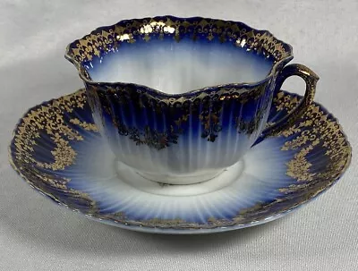 Antique Victoria Carlsbad Austria Flow Blue W Gold Trim Teacup Saucer Exquisite • $24.21