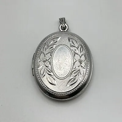 Vintage Sterling Silver Oval Locket With Floral Engraving • $45