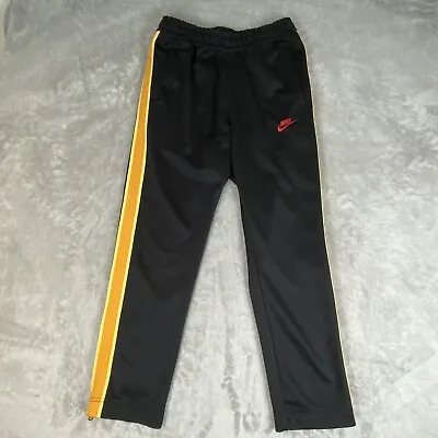 Nike Track Pants Men’s Size Medium Black Yellow Stripe Ankle Zip Logo • $22