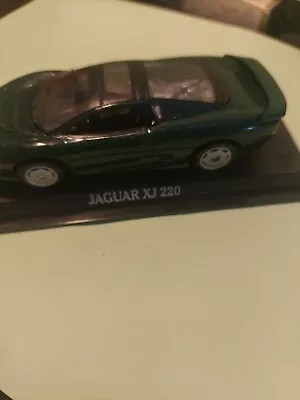 £7.68 • Buy JAGUAR XJ 220    1/43 HIGHLY DETAILED Miniature Model  Dark Green ON STAND AS IS