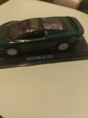 £7.68 • Buy JAGUAR XJ 220    1/43 HIGHLY DETAILED Miniature Model  Dark Green ON STAND AS IS