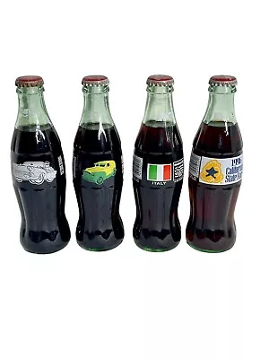 Lot Of 4 Commemorative Coca Cola Bottles 8oz Unopened Collectible  • $30