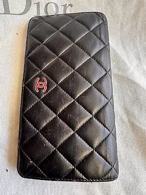 Chanel Women’s Leather Wallet • $350