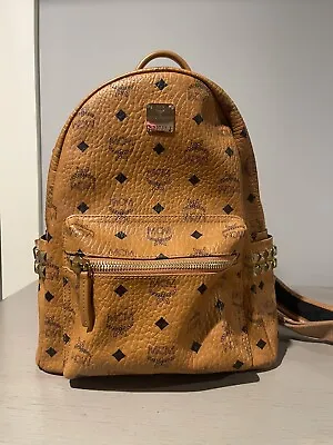 Authentic (MCM) Stark Bebe Boo Side Studs Backpack In Visetos (Cognac) • $400