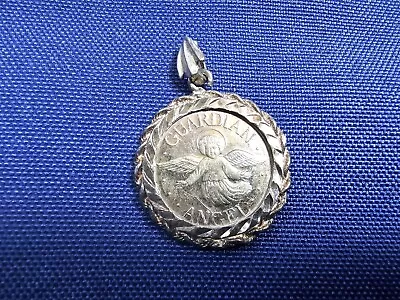 Grandma Grabe's Beautiful Vintage 999 Sterling Silver Guardian Angel Coin Pendan • $0.75