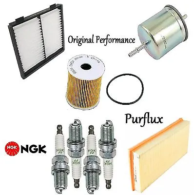 Tune Up Kit Cabin Air Oil Fuel Filters Spark Plugs For Volvo S40 L4 2004 • $71.91