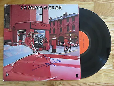 Ex VAN HALEN Lead Singer SAMMY HAGAR Signed SAMMY HAGAR 1977 Record / Album COA  • $140