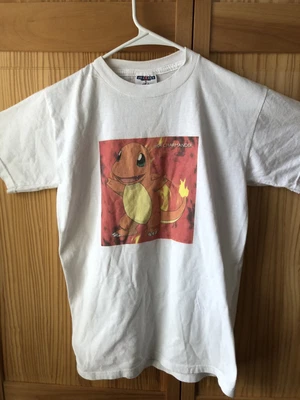$35 • Buy Vintage 90s Pokémon T-shirt. Collectible Item #O4 Charmander.