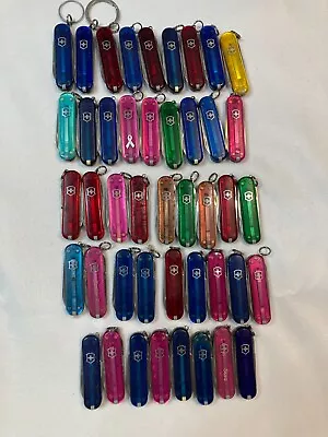 LOT Of 44 VICTORINOX CLASSIC KNIVES TRANSLUCENT COLORS • $125