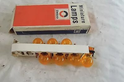 NOS Delco L3057NA Amber Bulbs 7 In Box • $10.99