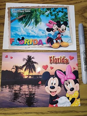 Lot Of 2 DISNEY FLORIDA POSTCARDS MICKEY MINNIE Sunset Beach Romantic • $1.45