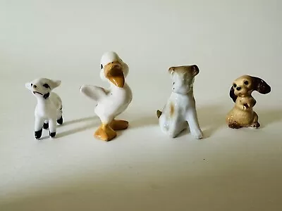 Lot Of 4 Miniature Porcelain Animal Figurines Lamb Duck Terrier Spaniel Dog • $1.98