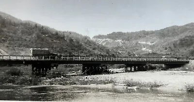 WW2 Era U.S. Military Truck Driving On A Bridge In Hawaii  • $5.25