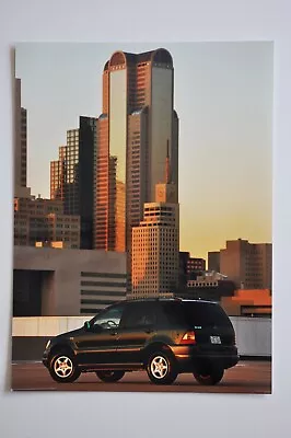 Car Press Photo - 1997 Mercedes-Benz M-Class - Black - Side / Back View • $9.95