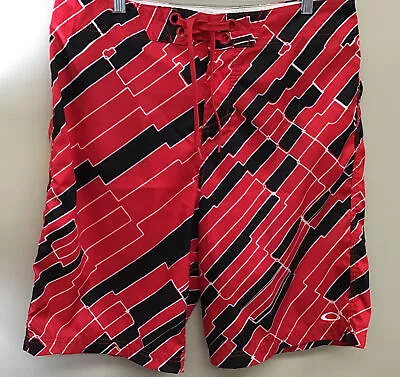 $12.50 • Buy Oakley Men’s Size 34 Swim Trunks Board Shorts Red Colorblock Abstract Pattern