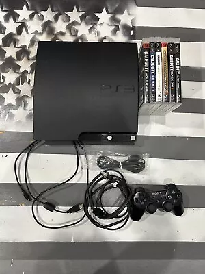 Sony PlayStation 3 - Slim 250GB Console. W/controllercords And 6 COD Games • $105