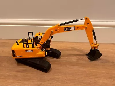 JCB Tracked Excavator Toy - 28 X 10 X12 Cm  • £20