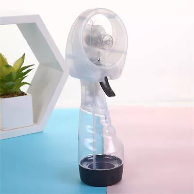 Portable Hand Held Battery Power Fan Air Water Mist Bottle Cooling Spray Office • £7.59