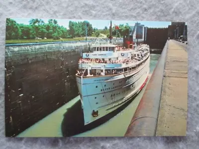 S.S. South American Locking Through Sault Ste. Marie Michigan Postcard • $9.45