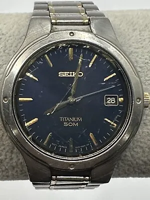 Seiko 7N42-0BX0 Mens 50m Titanium Blue Dial Watch Date New Battery 37MM Y • $49.99