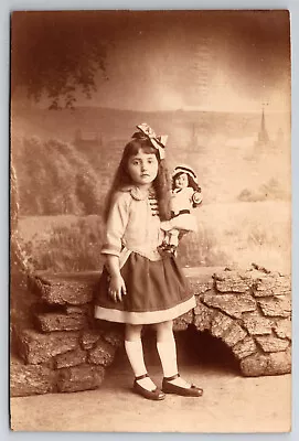 Vintage Antique Sepia Postcard Fasionable Girl With Her Doll RPPC • $6.99