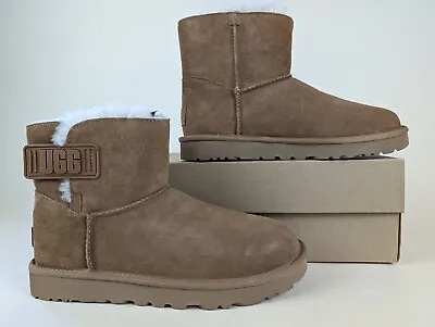 UGG Winter Boots Womens 9 M Mini Bailey Logo Strap Brown Suede Plush Shoes NWB • $79.95