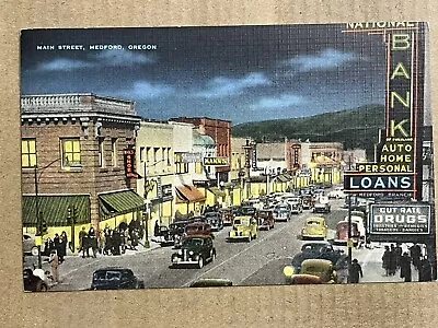 Postcard Medford OR Oregon Main Street Downtown Night View Drug Store Bank • $7.99