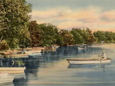 Vintage Linen Postcard Greetings From Muskegon Michigan MI Lake Shore Canoe • $5.99
