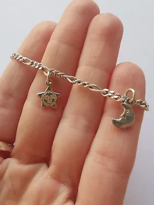 Sterling Silver Figaro Link Moon And Star Bracelet. R99  • $5.05