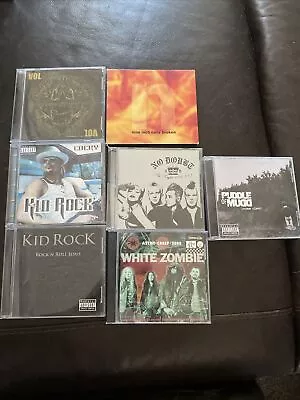 Lot Of 7 Rock Metal Cds No Doubt NIN Kid Rock Volbeat Puddle Of Mudd  • $5