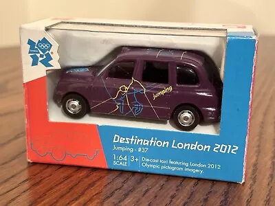 Destination London 2012 - Die Cast Model Olympic Taxi Cab - 1:64 Scale Purple • £5