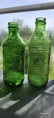 2 Vintage Embossed 10oz 7up Soda Bottles. 1966 & 1979. Mint Condition • $20