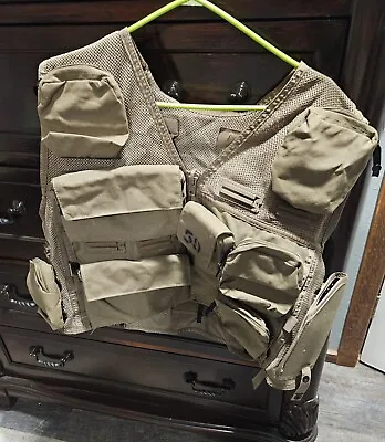 Ultimate Survival Technologies Snaptrack Vest. Has 9 POUCHES 1 PISTOL POUCH  • $160